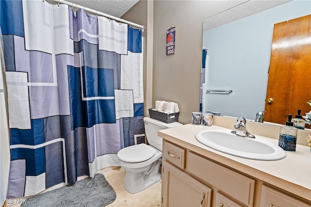 bathroom featuring curtained shower, a textured ceiling, toilet, and vanity