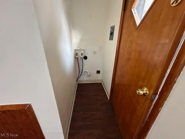 hallway featuring dark wood-type flooring