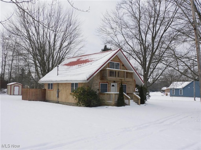 exterior space featuring a storage shed