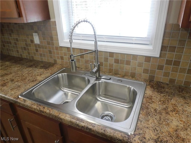 room details with tasteful backsplash and sink