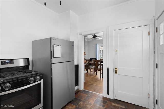 kitchen featuring ceiling fan and appliances with stainless steel finishes