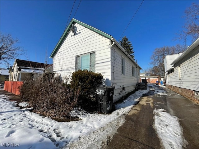 view of snow covered property