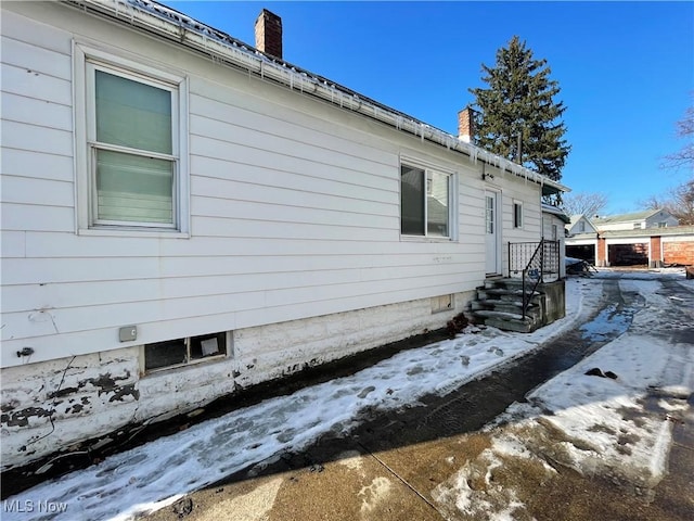 view of snow covered property