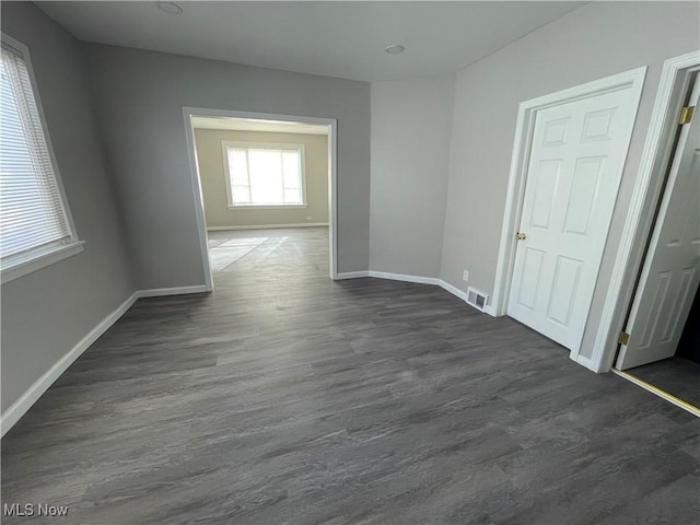 interior space featuring dark hardwood / wood-style flooring