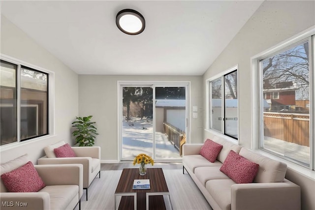 sunroom / solarium with lofted ceiling