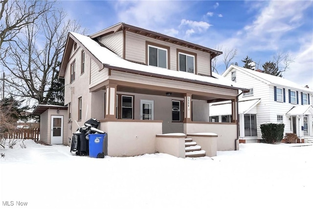 view of front of property featuring covered porch