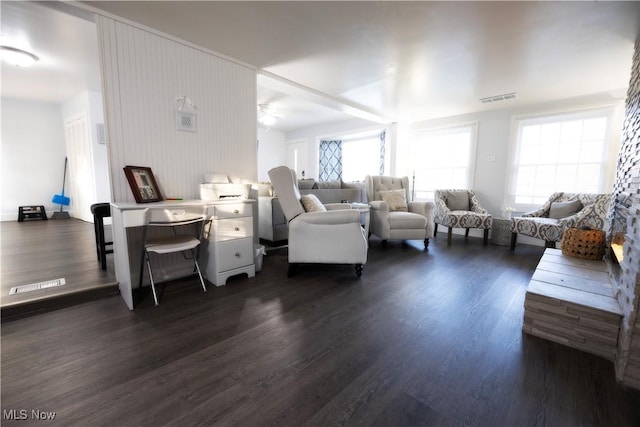 living room featuring dark hardwood / wood-style flooring