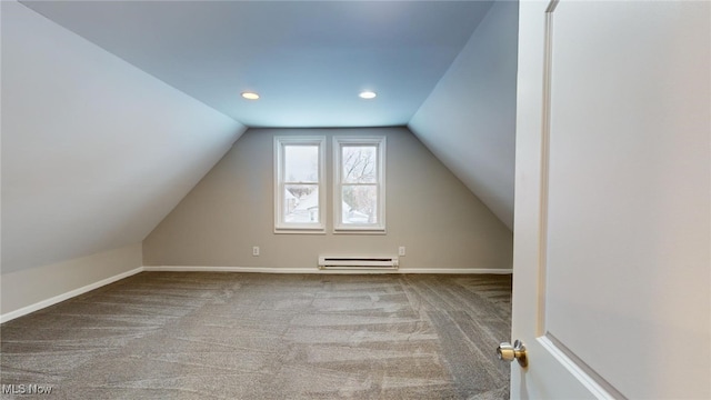 bonus room with carpet floors, lofted ceiling, and a baseboard radiator