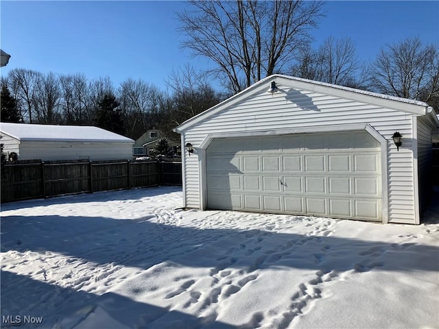 view of snow covered garage