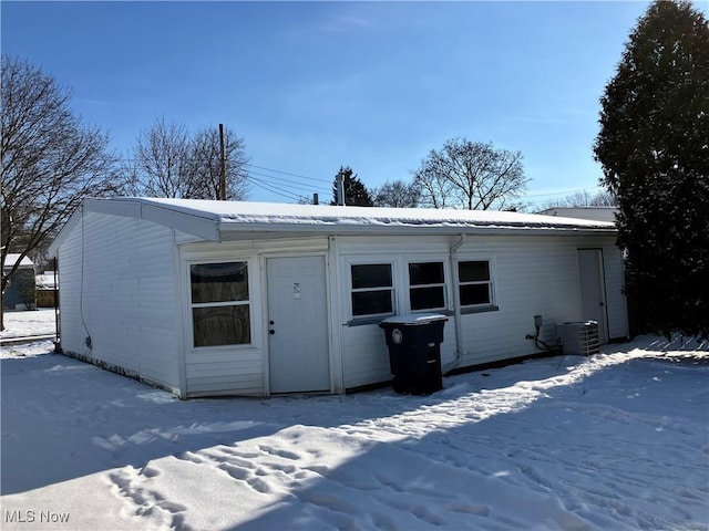 view of snow covered property