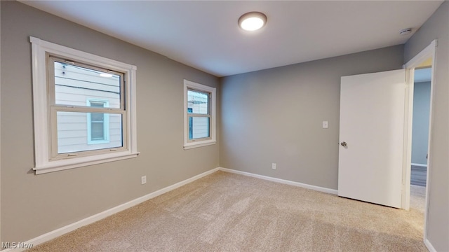 view of carpeted spare room