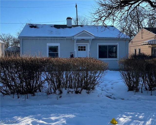 view of snow covered property