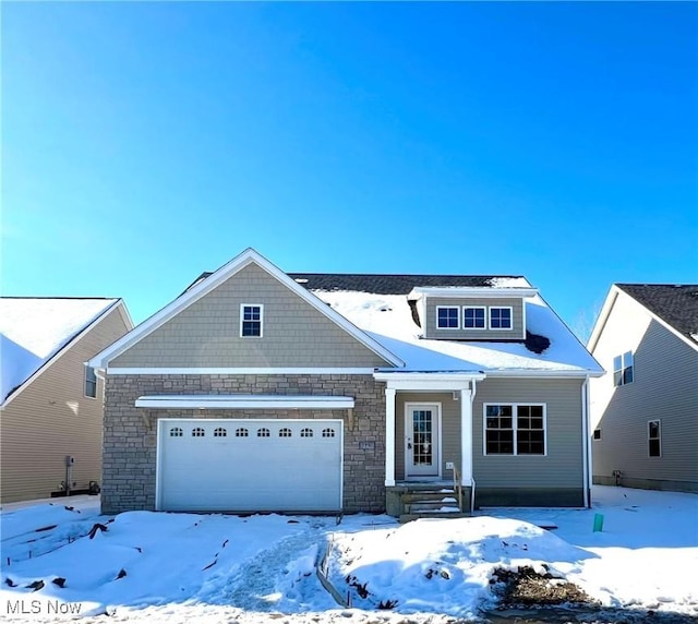 view of front of property featuring a garage