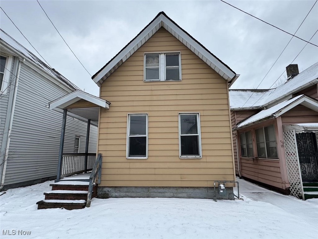 view of snow covered property