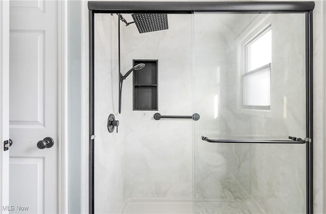 bathroom with walk in shower