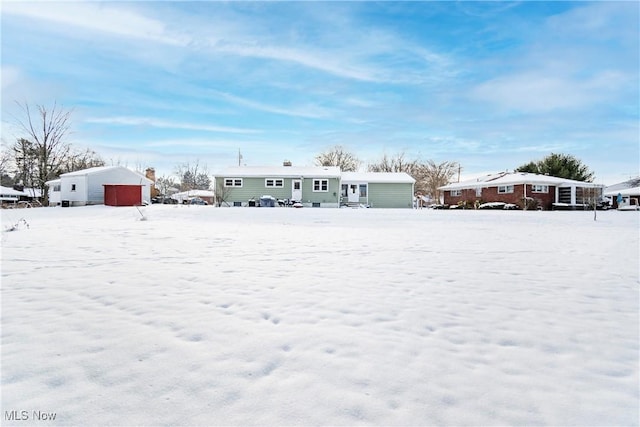 view of snow covered property