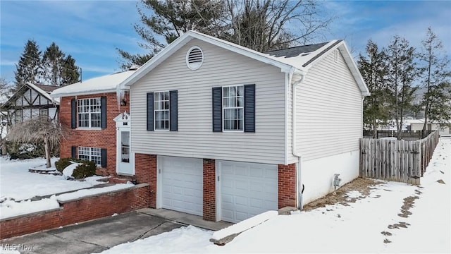 view of front of property with a garage