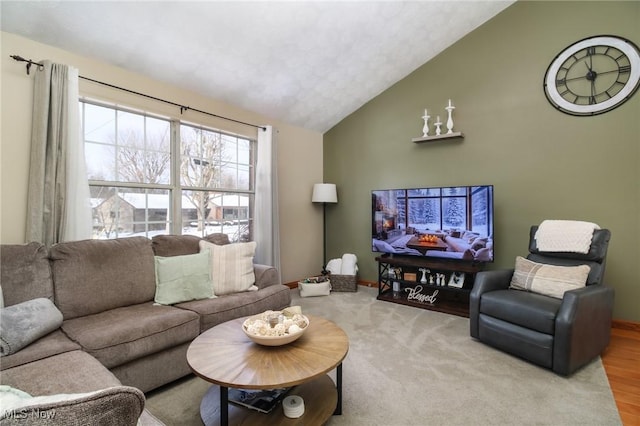 living room with lofted ceiling