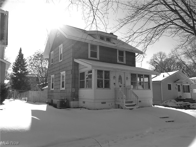 view of front property with central air condition unit