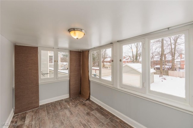 view of unfurnished sunroom