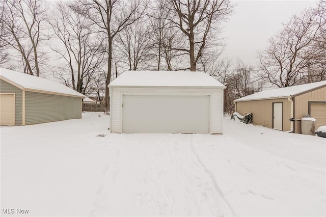 view of snow covered garage