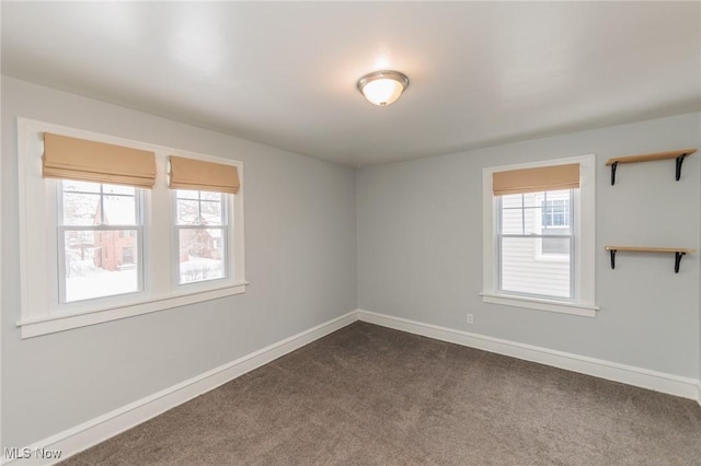 view of carpeted spare room