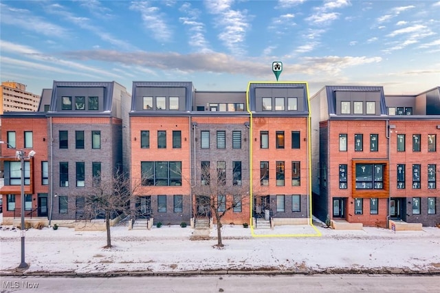 view of snow covered building