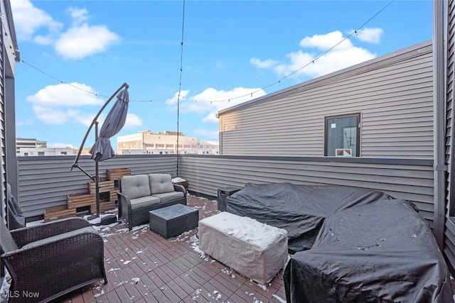 view of patio featuring a wooden deck and an outdoor hangout area