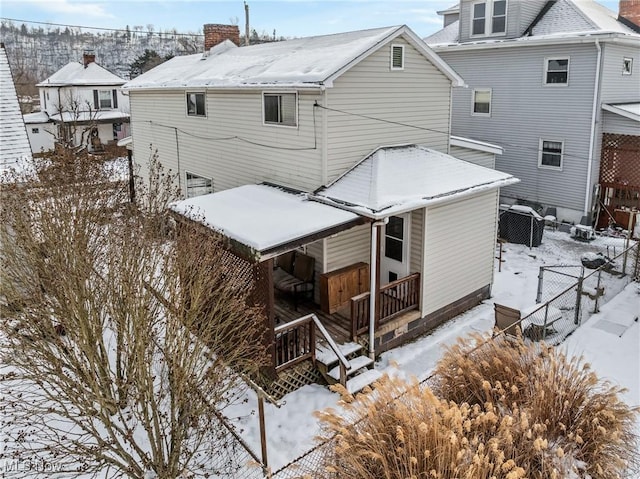 view of snow covered property