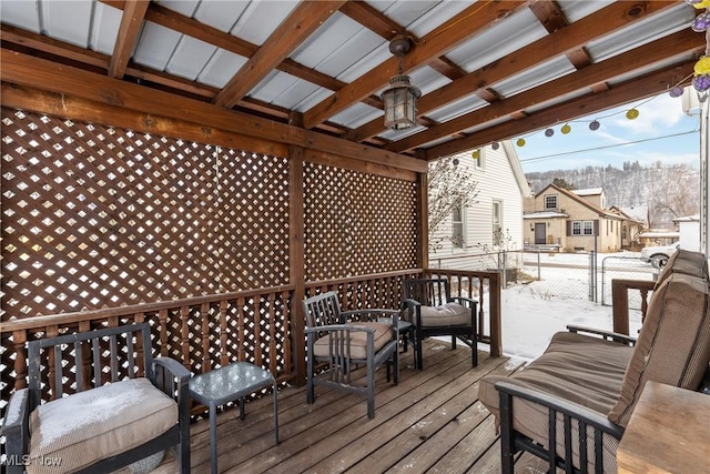 view of snow covered deck