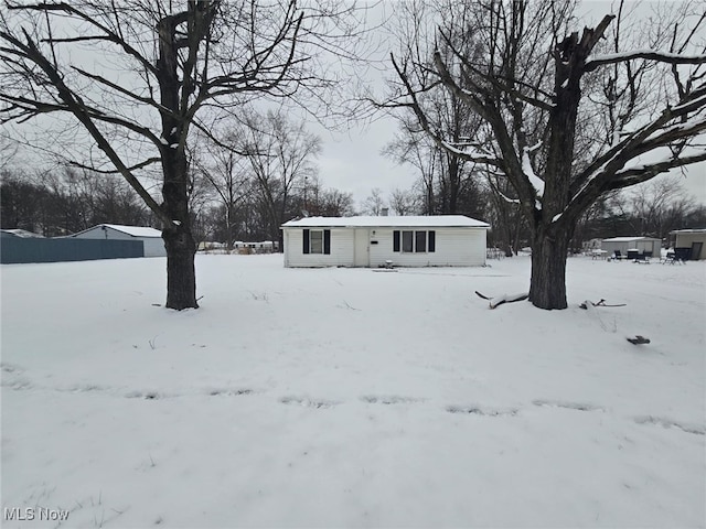 view of yard covered in snow