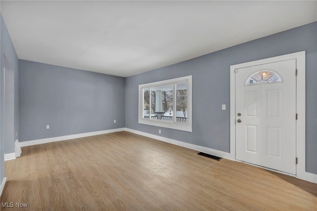 foyer featuring light hardwood / wood-style floors