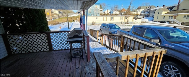 view of snow covered deck