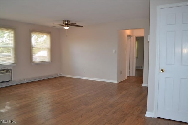 unfurnished room with ceiling fan, a wall mounted AC, and dark hardwood / wood-style floors