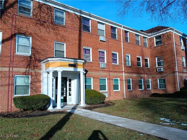 view of building exterior featuring cooling unit