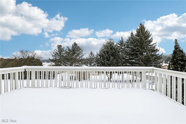 view of snow covered deck