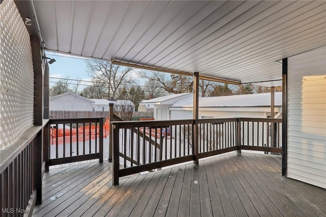 view of snow covered deck