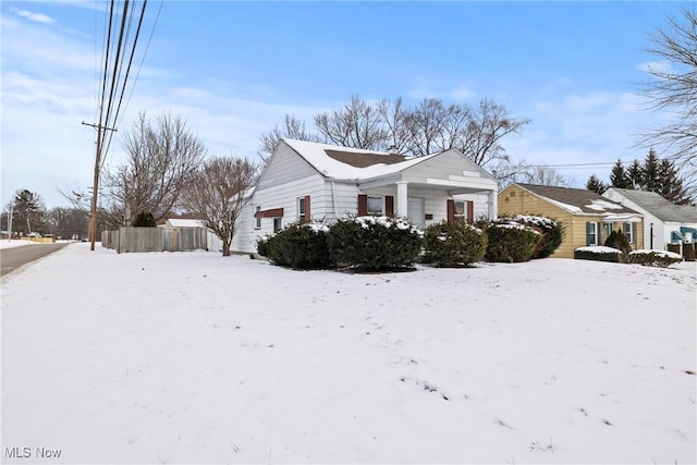 view of snow covered property