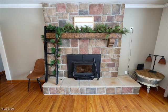 details with ornamental molding and hardwood / wood-style floors