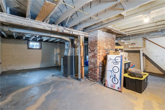 basement featuring heating unit