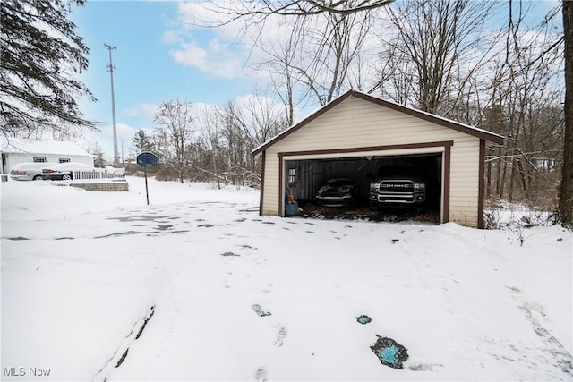 view of snow covered garage