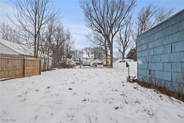 view of yard covered in snow