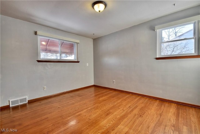 empty room featuring light hardwood / wood-style flooring