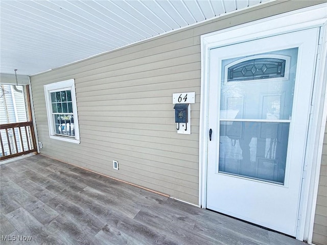 entrance to property with covered porch