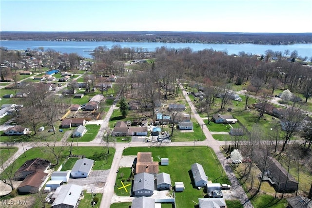 bird's eye view with a residential view and a water view