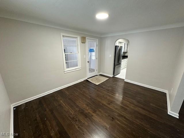 entryway with dark wood-type flooring