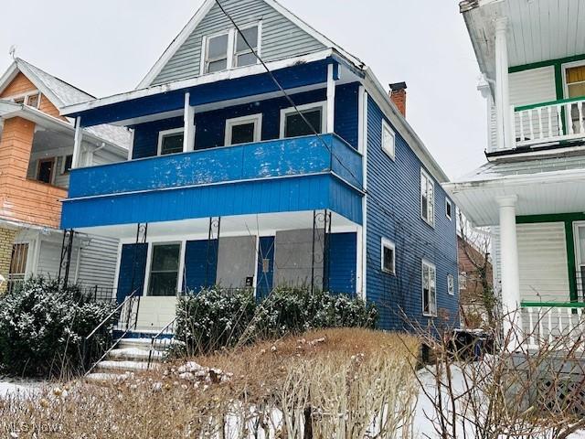 711 E 117th St, Cleveland, OH 44108 - view of front facade featuring covered porch