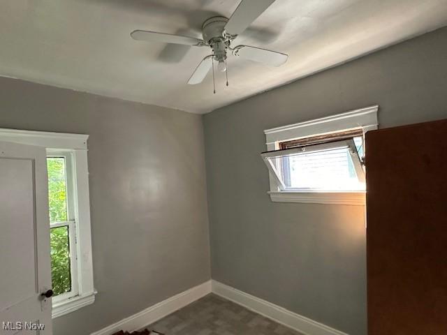 unfurnished room featuring ceiling fan