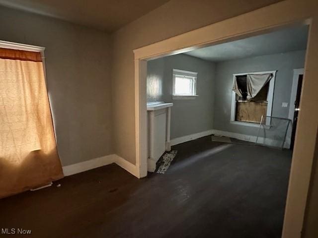 spare room featuring dark hardwood / wood-style floors