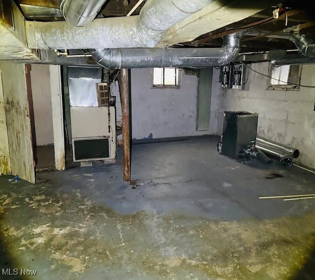 basement featuring heating unit